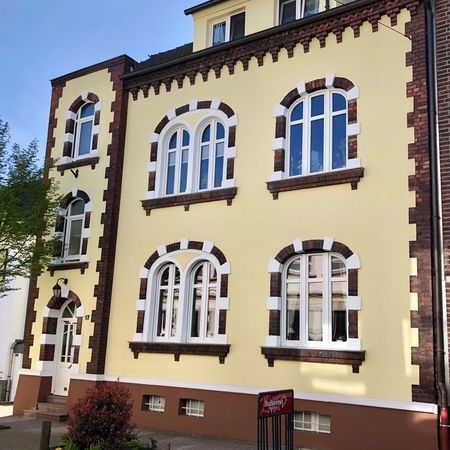 1. Preis Fassadenwettbewerb, Gewebeeinbettung mit Fassadenanstrich in Oberhausen-Sterkrade ausgeführt von Malerbetrieb Overdreef